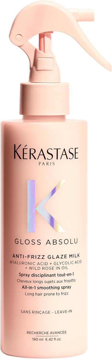 Kérastase Gloss Absolu Anti-Frizz Shine Milk | Professional leave-in styling milk to tame frizz and boost brilliant high shine, formulated with acidic pH and Vitamin E.
